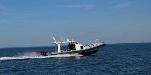 Silver Ships Ambar Series AM 1200 patrol boat on the ocean with open pilothouse